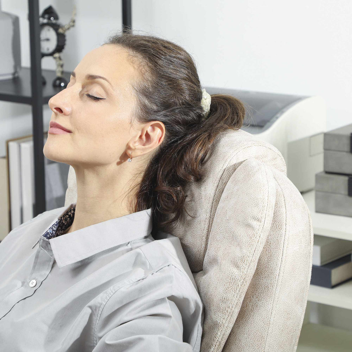Ergonomische bureaustoel met massage, kantelfunctie en voetsteun