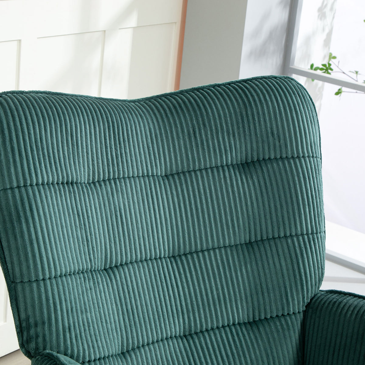 Donkergroene schommelstoel – houten lopers, relaxfauteuil