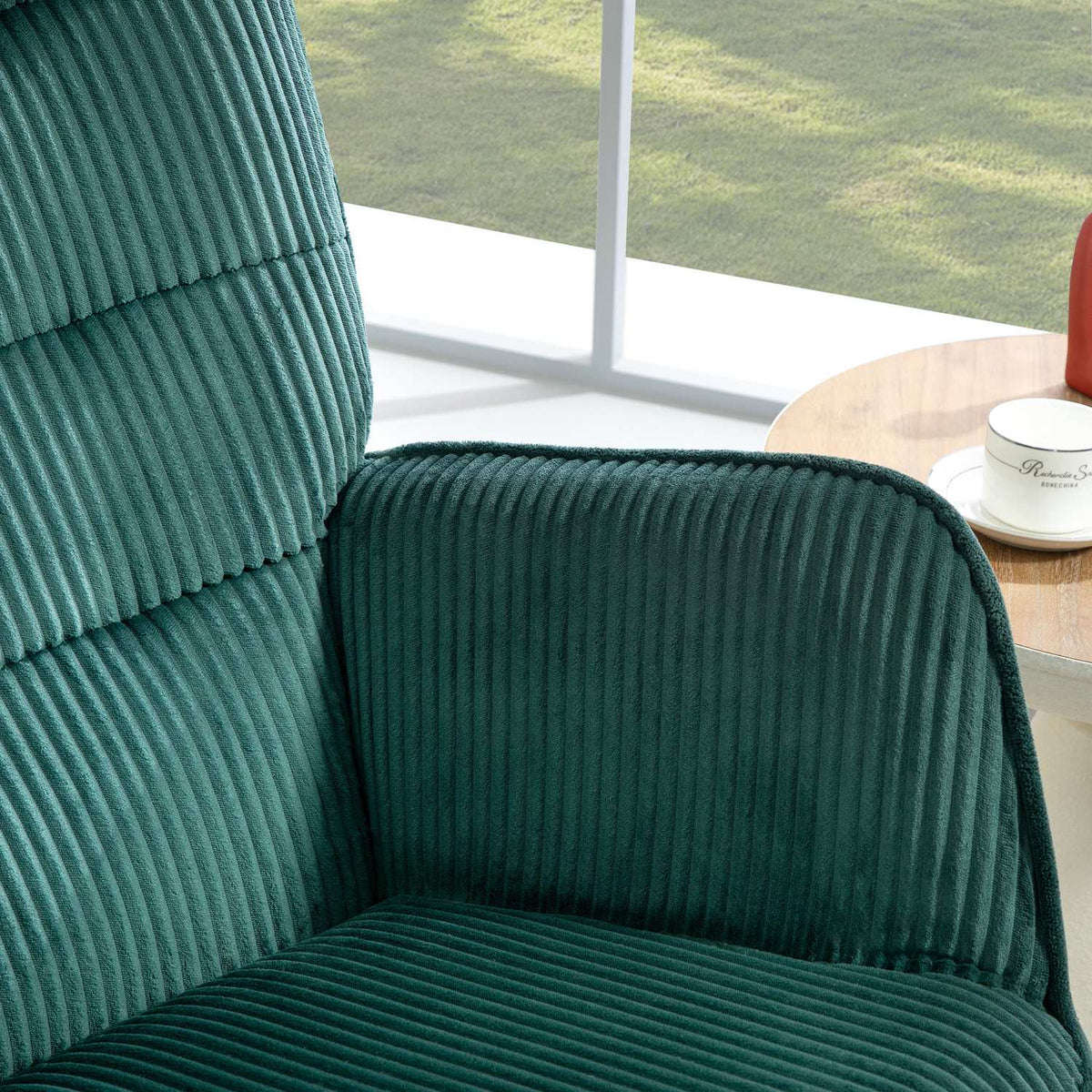Donkergroene schommelstoel – houten lopers, relaxfauteuil
