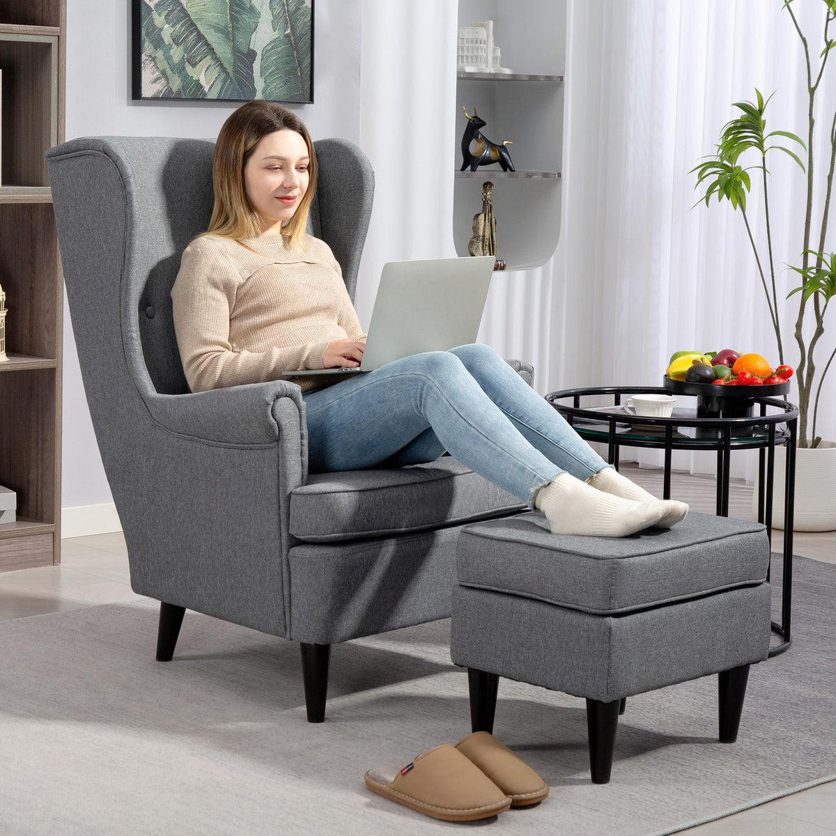 Wingback fauteuil met poef, grijze stof, rubberhouten poten
