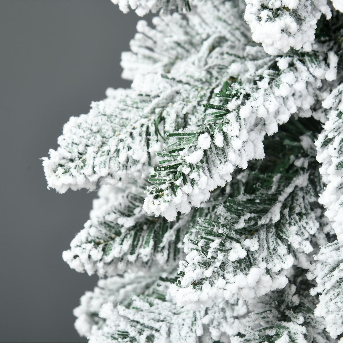 Kunstkerstboom van 180 cm met sneeuw en standaard