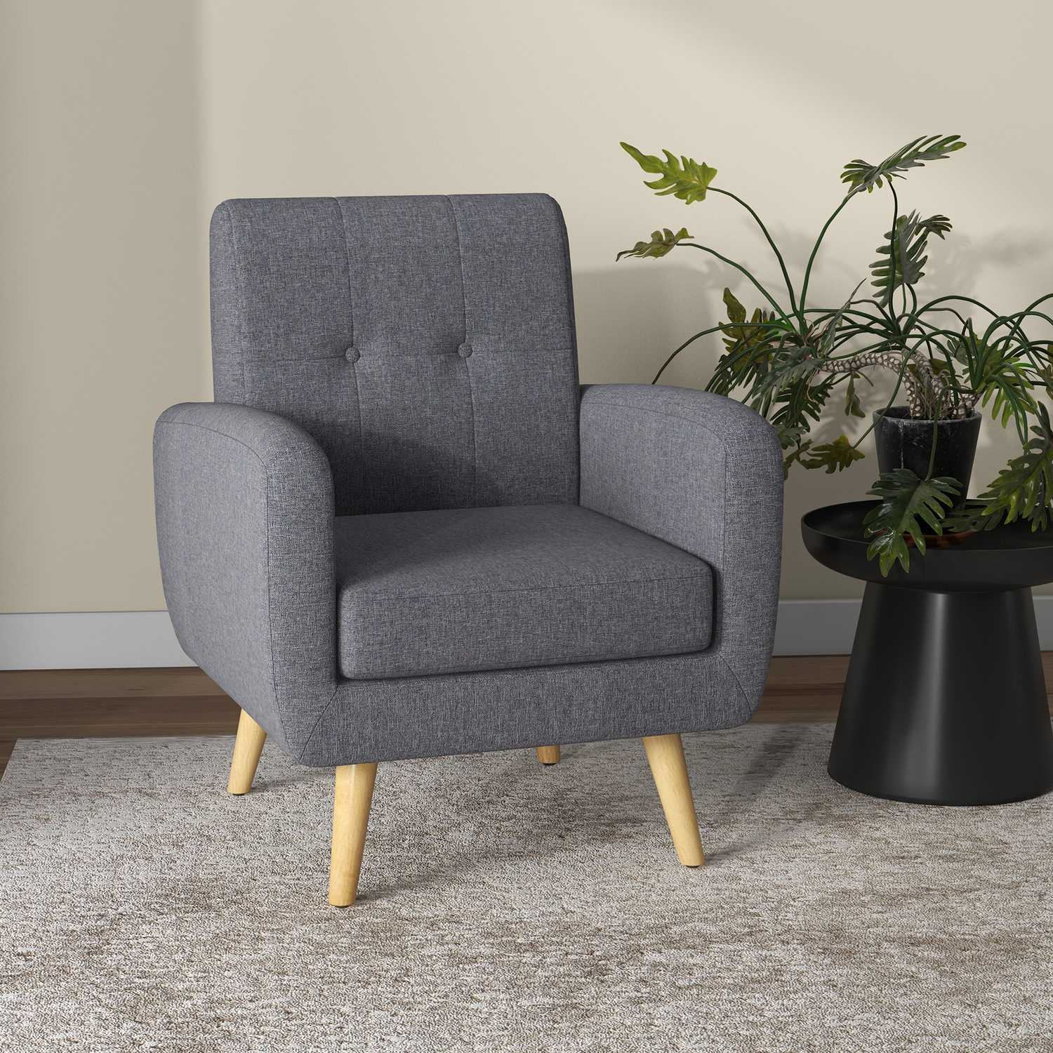 Lichtgrijze gestoffeerde fauteuil voor de woonkamer